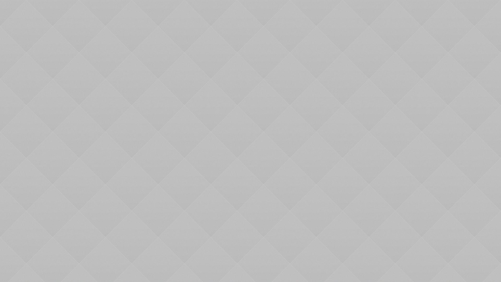 A gray background with a diamond pattern. A gray background with a diamond pattern.